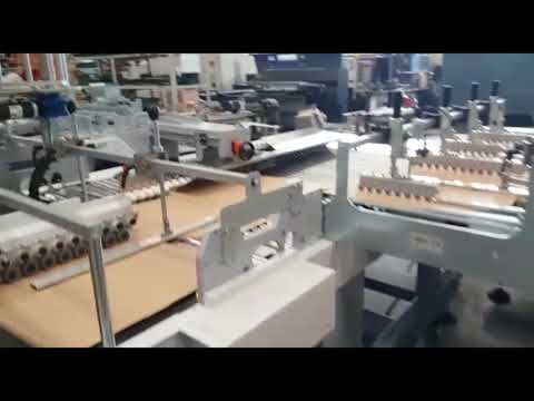 Application of tear tape and double sided tape on corrugated board | Ortigia Machine A/17